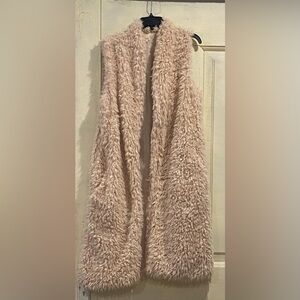 Long, beige, faux fur vest with pockets by Listicle. Worn very little.